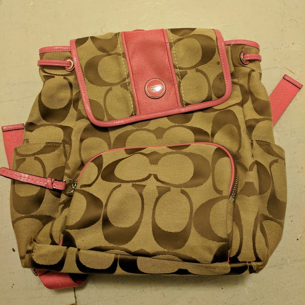 Coach mini backpack and Coach red hat